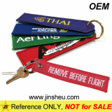 Custom Made Embroidered Remove Before Flight Keychain